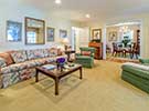 Cozy furniture and an open floor plan define the Living Room